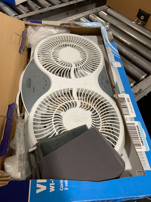 Photo 1 of Comfort Zone Living Comfort Smart Wi-Fi Reversible Twin Window Fan with Removable Cover and Bug Screen