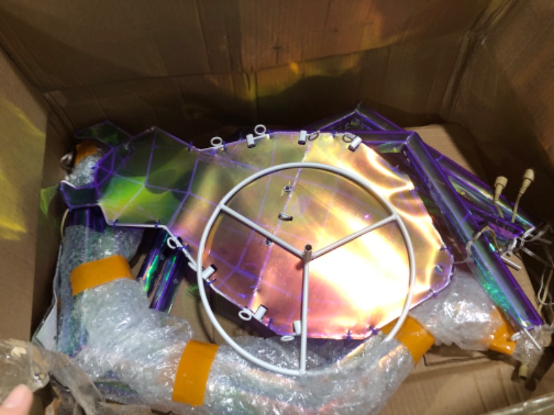 Photo 1 of Prismatic Iridescent Giant Spider, 52" Pre-lit Large Outdoor Scary Prismatic Spider Decorations for Halloween 140 LED Light Up Giant Spider Outdoor Halloween Decorations for Garden, Yard, Porch