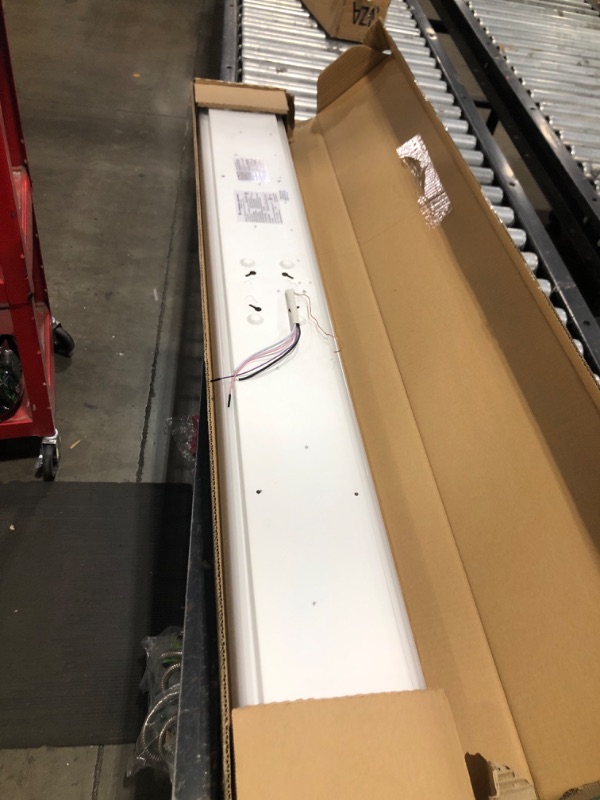 Photo 1 of Lithonia Lighting TruWrap 4 Foot LED Ceiling Light Fixture, Low-Profile Wraparound LED Shop Light, Adjustable Lumens, Selectable Warm White/Cool White/Daylight Color, Curved Diffuser, Narrow Width