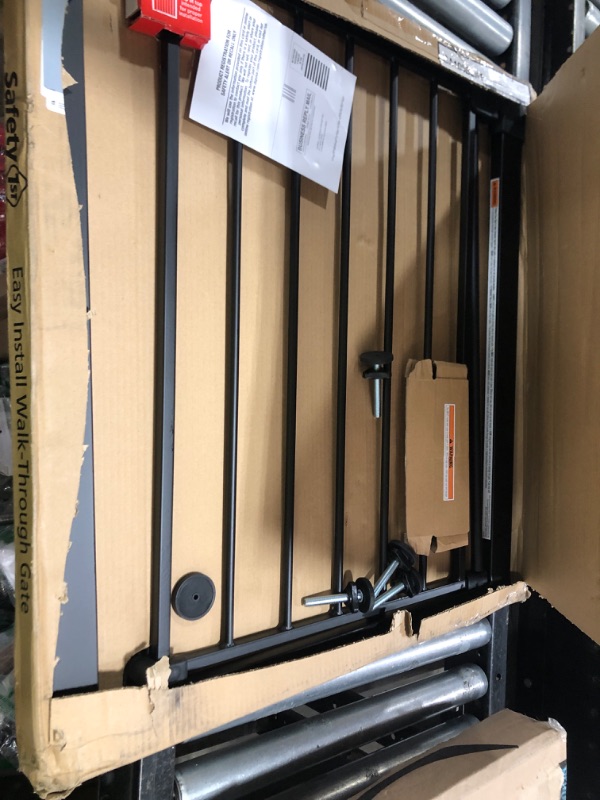 Photo 1 of Safety 1st Easy Install 28'' Walk Thru Gate, Fits Between 29'' and 38'', Black, 1-Pack,(GA105CBLK)