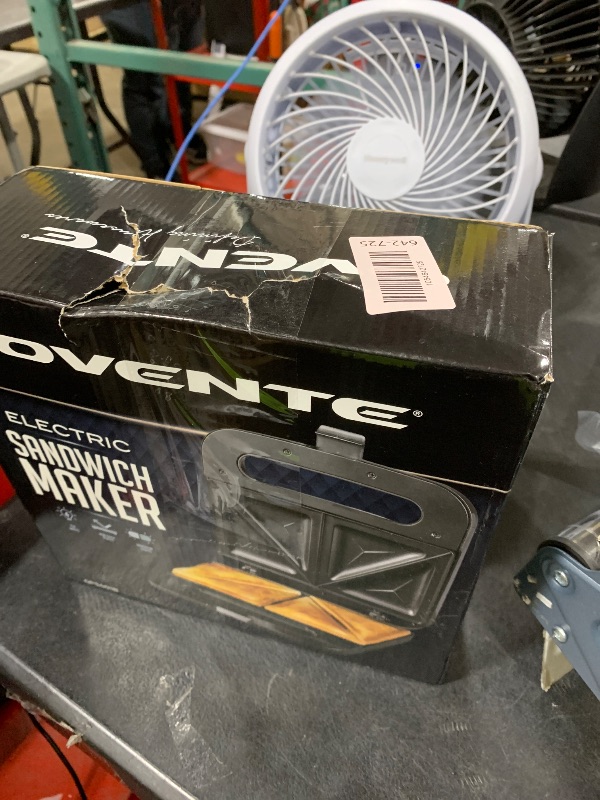 Photo 1 of OVENTE Electric Sandwich Maker with Non-Stick Plates, Indicator Lights, Cool Touch Handle, Easy to Clean and Store, Perfect for Cooking Breakfast, Grilled Cheese, Tuna Melts and Snacks, Black GPS401B