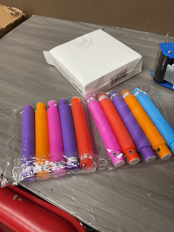 Photo 1 of 12 Pcs  Pop Tubes, Glow Sticks Bulk Party Favors for Kids 4-8 8-12 Pinata Goodie Bags Stuffers for Boys Girls Birthday Christmas Gifts Fidget Sensory Toys Glow in the Dark Party Supplies