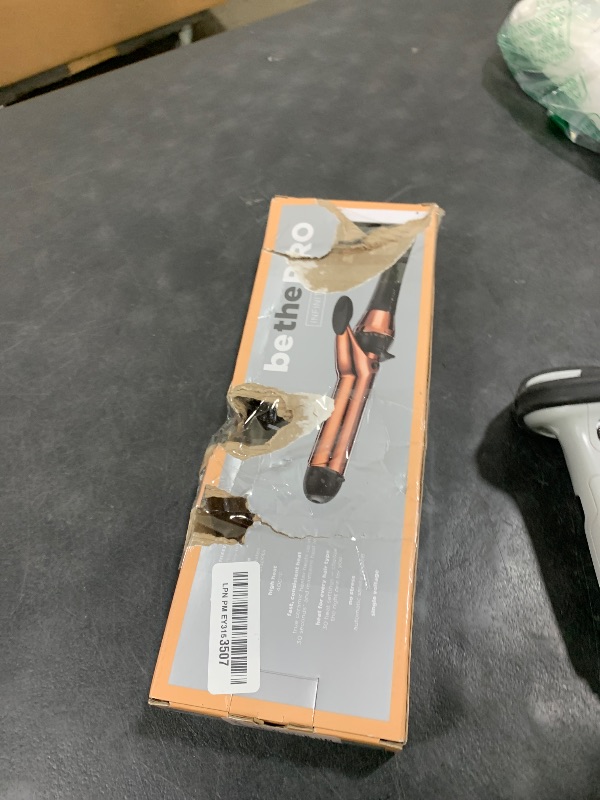 Photo 1 of INFINITIPRO BY CONAIR Rose Gold Titanium 1 1/4-Inch Curling Iron, 1 ¼ inch barrel produces loose curls – for use on medium and long hair