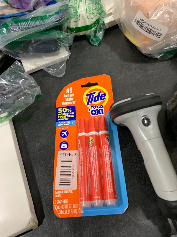 Photo 1 of Tide Stain Remover for Clothes, Tide To Go Pen, Instant Stain Remover Pen & Spot Cleaner, Portable & Travel-Friendly, Works on Food & Drink Stains, Fits in Purses & Bags, 3 Count (Pack of 1)