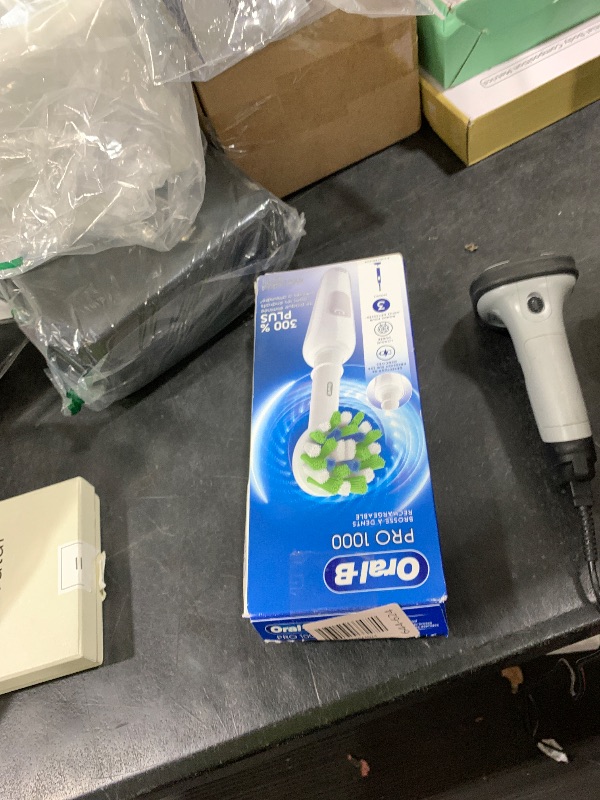 Photo 1 of Oral-B Pro 1000 Rechargeable Electric Toothbrush, White