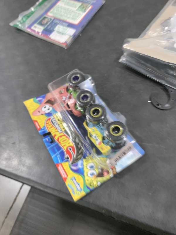 Photo 1 of Hot Wheels Monster Trucks 2-Pack, Demolition Doubles Set of 2 Toy Vehicles in 1:64 Scale, for Kids & Collectors (Styles May Vary)
