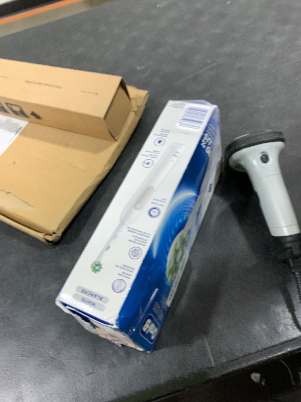 Photo 1 of Oral-B Pro 1000 Rechargeable Electric Toothbrush, White