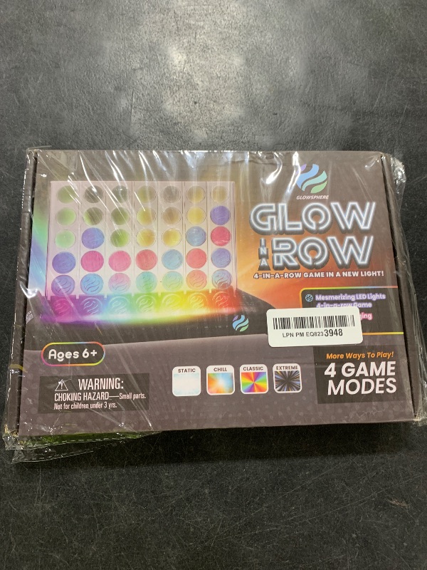 Photo 1 of Glow in a Row Light-Up 4 in a Row Board Game, Strategy Games for Kids Ages 6 and Above, 2 Player Game, Perfect for Kids and Adults Family Game Night