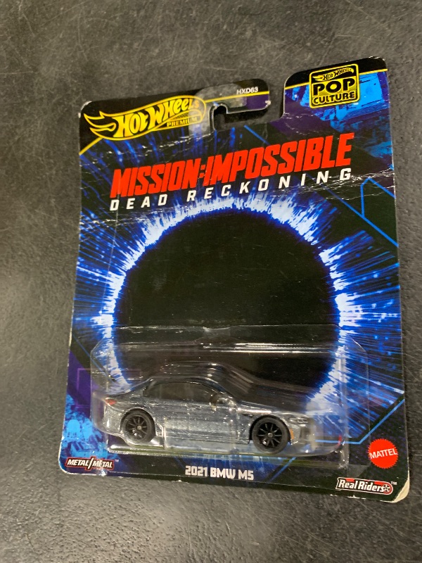 Photo 1 of Hot Wheels Premium Toy Car, Truck or Van, 1:64 Scale Die-Cast Replica from Popular Movie, TV Show or Video Game (Styles May Vary)