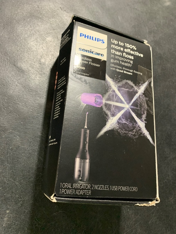 Photo 1 of Philips Sonicare Cordless Power Flosser 3000, Water Flosser with Innovative Quad Stream Technology, Oral Irrigator with 2 Flossing Modes and 3 Intensity Levels, Ergonomic Design, Black, HX3826/23