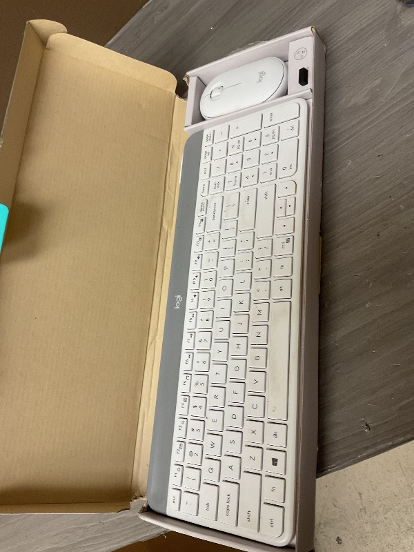 Photo 1 of Logitech MK470 Slim Wireless Keyboard and Mouse Combo - Modern Compact Layout, Ultra Quiet, 2.4 GHz USB Receiver, Plug n' Play Connectivity, Compatible with Windows - Off White