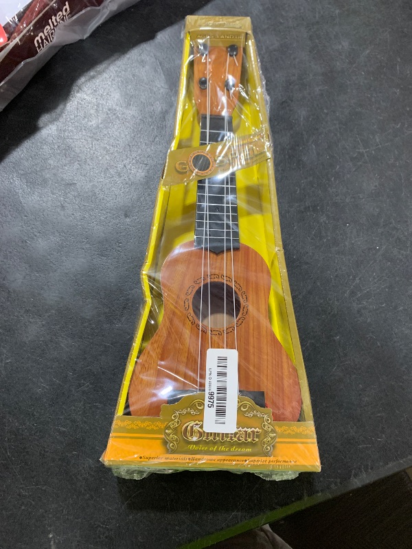 Photo 1 of Kids Toy Ukulele Guitar,17 Inch Classical Guitar Musical Toy,4 Strings Guitar Ukulele Educational Learning Toy for Toddlers and Preschoolers
