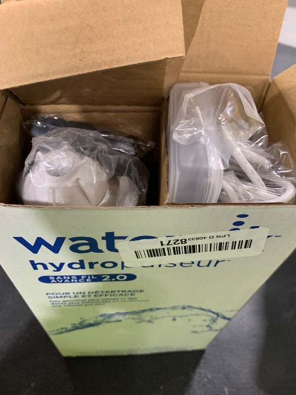 Photo 1 of Waterpik Cordless Advanced 2.0 Water Flosser For Teeth, Gums, Braces, Dental Care With Travel Bag and 4 Tips, ADA Accepted, Rechargeable, Portable, and Waterproof, White WP-580, Packaging May Vary