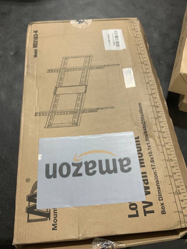 Photo 1 of Mounting Dream TV Mount Fixed for Most 42-84 Inch Flat Screen TVs, TV Wall Mount Bracket up to VESA 600 x 400mm and 132 lbs - Fits 16"/18"/24" Studs - Low Profile and Space Saving MD2163-K