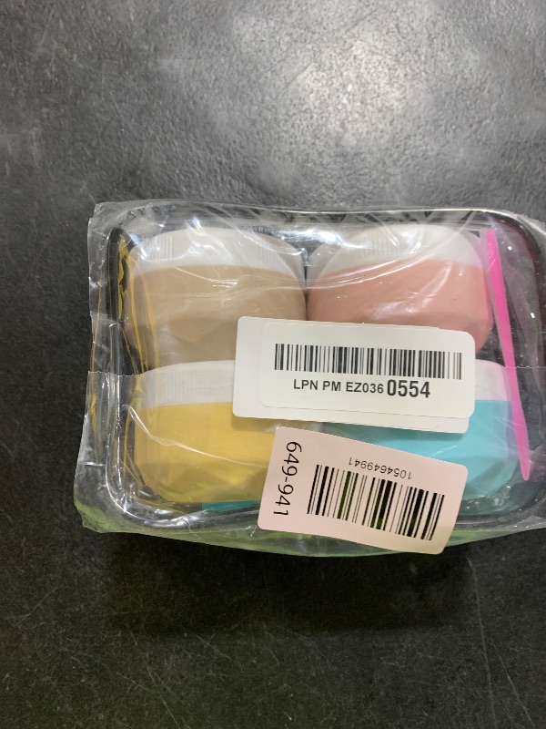 Photo 1 of Travel Containers for Toiletries, 4-Pack TSA Approved Silicone Jars (1.7oz) - BPA Free Leakproof Cosmetic Containers for Creams, Lotion, Skincare & Makeup with Bonus Waterproof Bag
