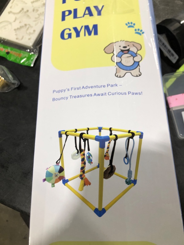 Photo 1 of Dewonch Puppy Play Gym with 8 Hanging Toys, Small Dogs Indoor Jungle Gym, PVC Frame with Bungee Straps Enrichment Activity Center