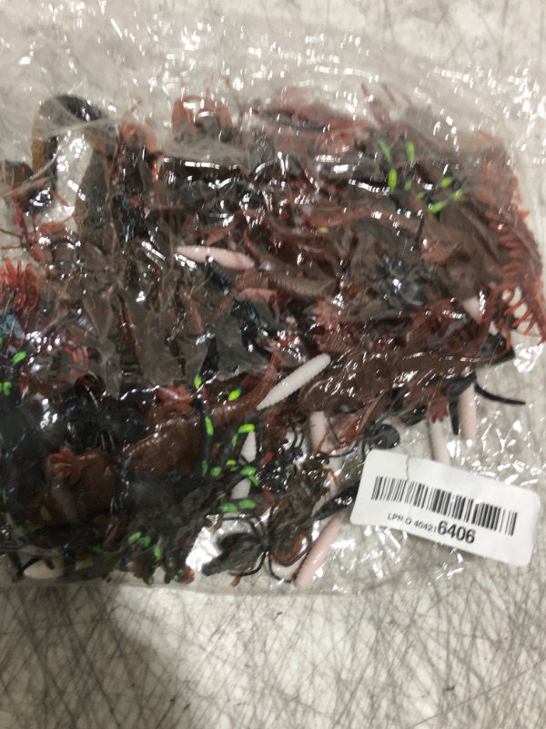 Photo 1 of Whaline 148Pcs Halloween Plastic Bugs Trick Joke Decoration Scary Insects Prank Toys Fake Snake Centipedes Cockroaches Spiders for Halloween Party Favor April Fools Day Decor, 9 Types