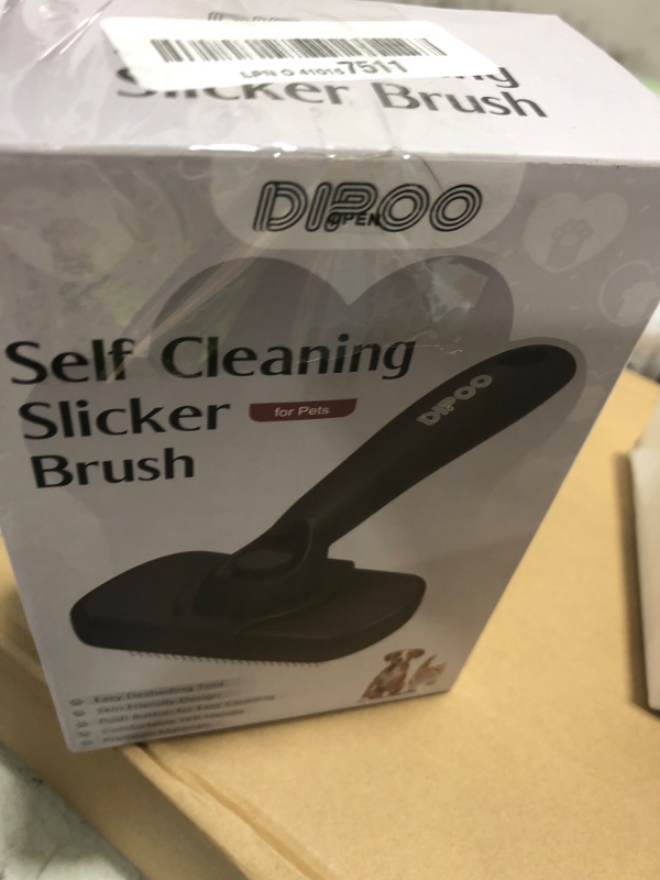 Photo 1 of Dipoo Self Cleaning Shedding Brush - Skin Friendly Grooming Tool for Dogs, Cats, and Puppies, Deshedding and Hair Removal for Long and Short Haired Pets, Black