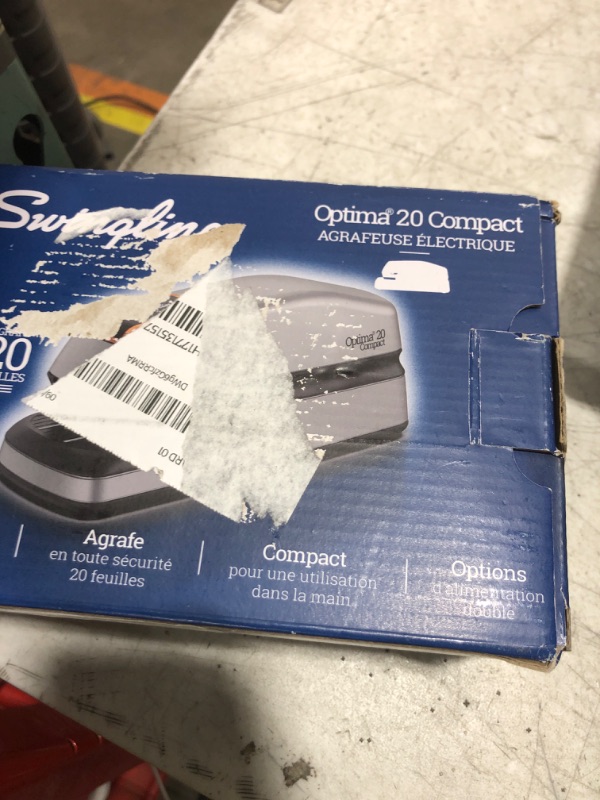 Photo 1 of Swingline Electric Stapler, 20 Sheet Capacity, Optima 20, Jam Free, Compact, Automatic or Manual, Plug In or Battery, Orange and Gray (48207)