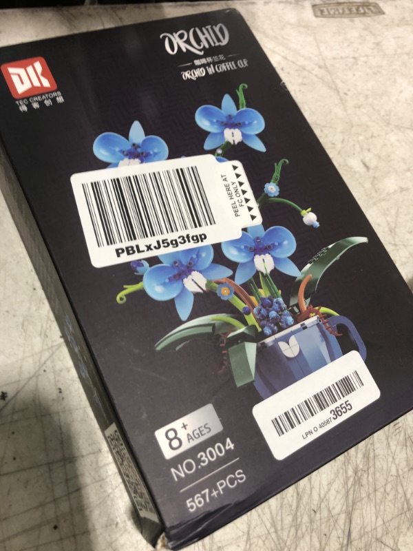 Photo 1 of iixeal Blue Orchid Flower Building Set for Adults, Coffee Cup Orchid Botanical Collection Plant Building Kit, Home and Office Decor Gift for Christmas Day, Valentines, Birthday 567pcs