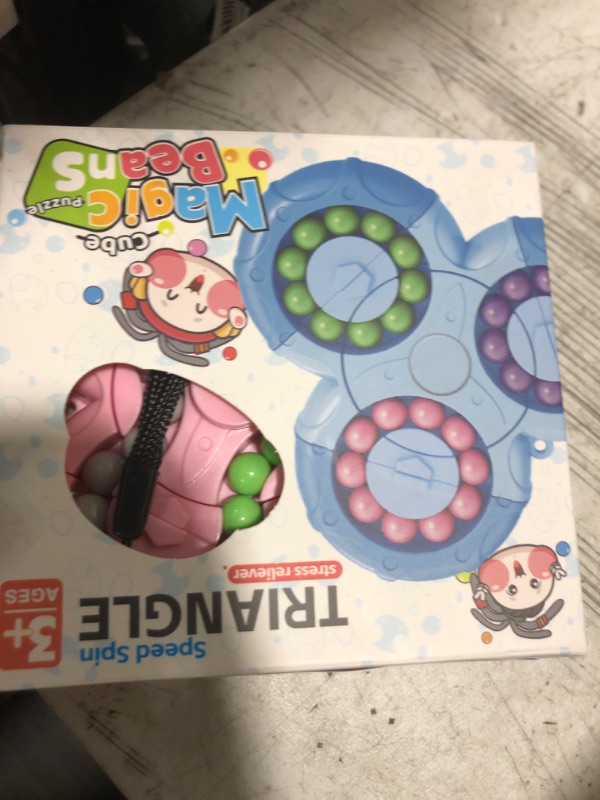 Photo 1 of MEIEST Rotating Magic Bean Cube Spinner,2 in 1 Funny Beads Puzzle Educational Toys,Stress Relief Fidget Hand Sensory Toy,Ideal Party Favor Anti-Anxiety Office Desk Toys(Pink)