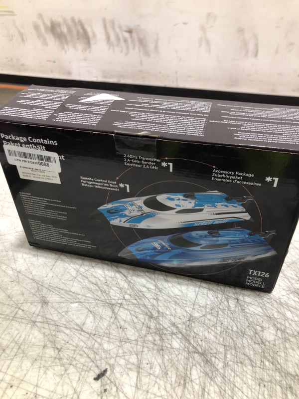 Photo 1 of BEZGAR RC Boat, 12 inch Remote Control Boat for Kids and Adults, 25 KPH Fast RC Speed Boats with 700mAh Battery, Ideal Waterproof Toy Boats for Lakes & Pools - TX126 Red