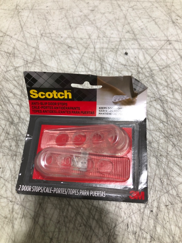 Photo 1 of Scotch Door Stoppers, 2 Count, 1-1/8 in., Flexible Material Assures Snug Fit Under Doors, Easy to Use Stops for Bottom of Door (SP947)