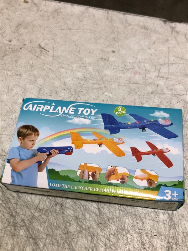 Photo 1 of Fuwidvia 3 Pack Airplane Launcher Toys, 13.2'' LED Foam Glider Plane Toy for Boys, 2 Flight Modes Outdoor Flying Toys Birthday Gifts for Boys Girls 4 5 6 7 8 9 10 11 12 Year Old (Blue&Green&Orange)
