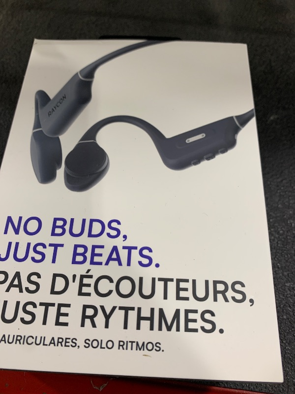 Photo 1 of Raycon Bone Conduction Headphones, Open-Ear Bluetooth Sports Earbuds with Mic, IP68 Water Resistant Headset for Workout and Running, 13hr Playtime (Gray)