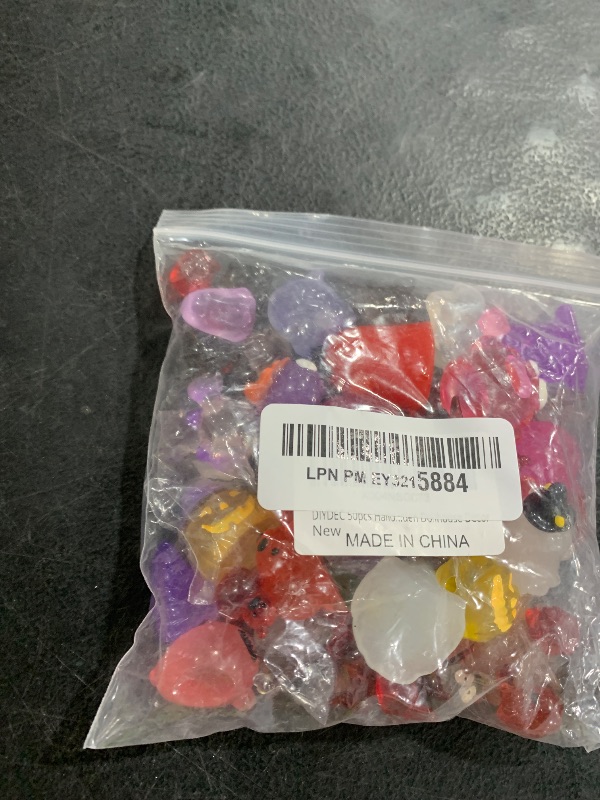 Photo 1 of DIYDEC 50pcs Halloween Luminous Mini Figures 50 Styles Halloween Miniatures Little Small Resin Pumpkin Ghost Skull Figures Bulk for Party Favors Bag Fillers Garden Dollhouse Decor