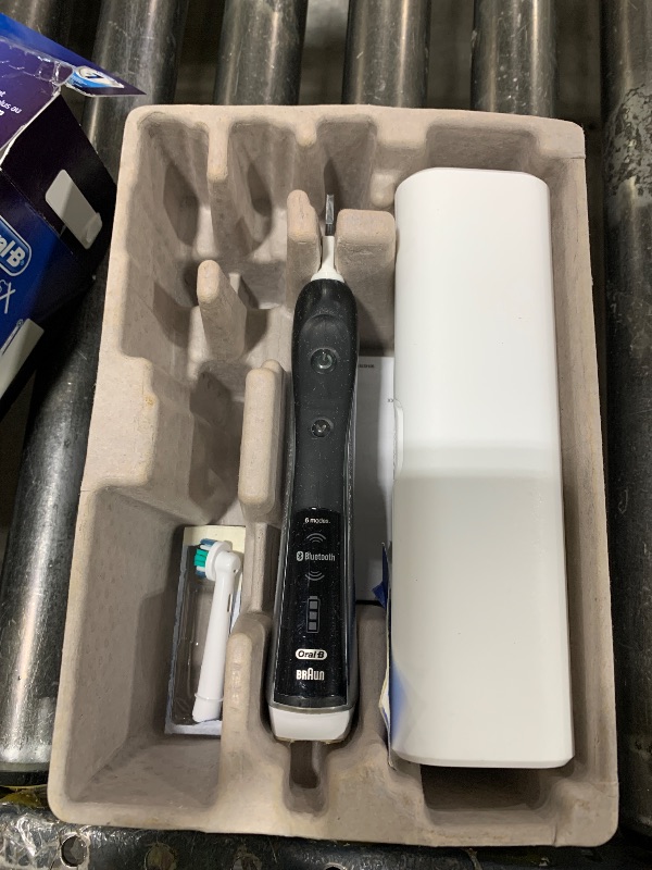 Photo 1 of Oral-B Genius X Limited Rechargeable Electric Toothbrush with 1 Replacement Brush Head, Travel Case, White