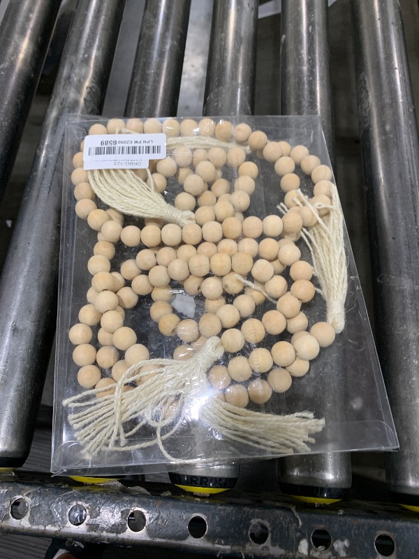 Photo 1 of DECORKEY Farmhouse Wood Beads Garland, 2 Pack 58 Inch Wooden Beads for Boho Home Decor with Tassels, Rustic Country Decor for Coffee Table, Wall, Shelf, Tray, Vase, Living Room, Bedroom