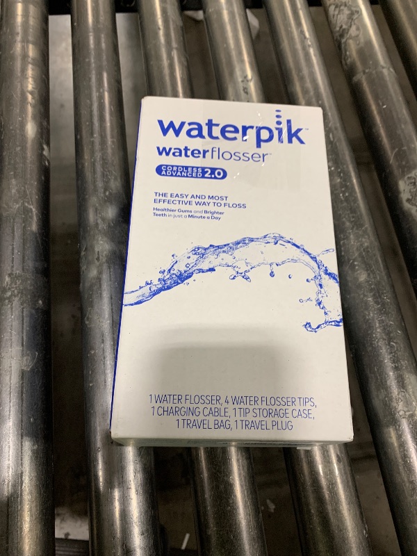Photo 1 of Waterpik Cordless Advanced 2.0 Water Flosser For Teeth, Gums, Braces, Dental Care With Travel Bag and 4 Tips, ADA Accepted, Rechargeable, Portable, and Waterproof, Black WP-582, Packaging May Vary