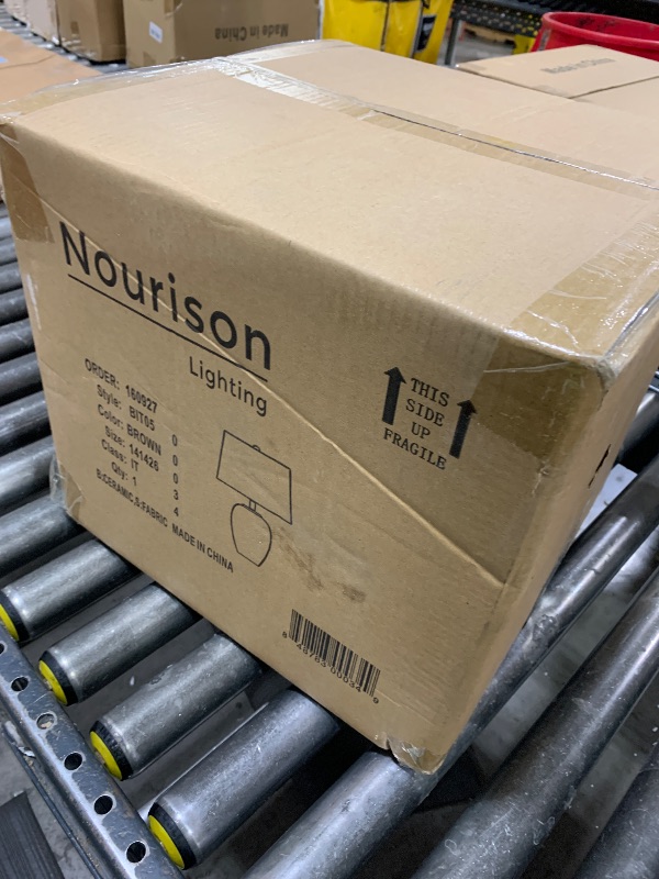 Photo 1 of  Nourison Home 23" Greyish Brown Earth Tone Rustic Farmhouse Ceramic Table Lamp for Bedroom, Living Room, Dining, Office, with Beige Linen Shade 

