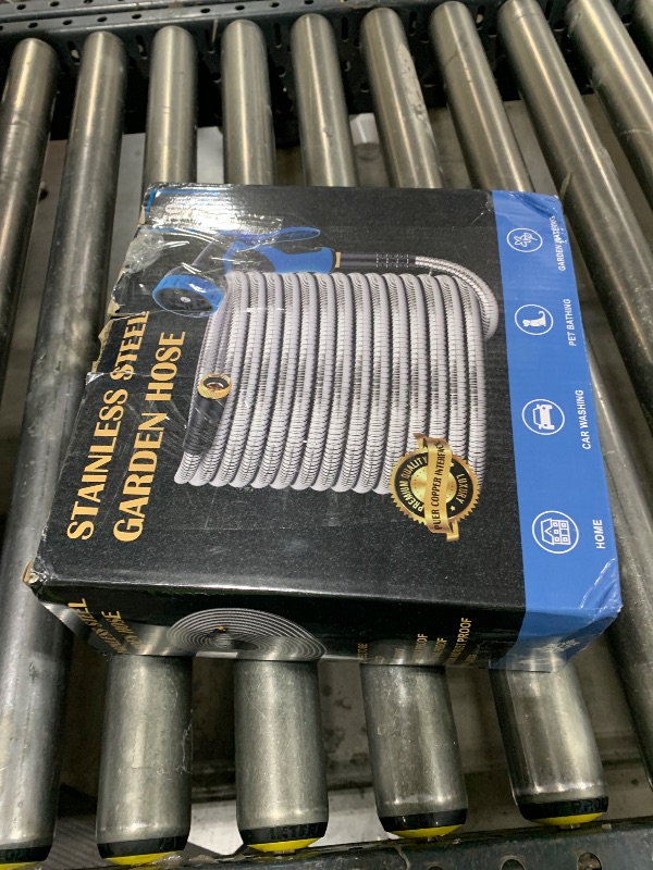 Photo 1 of Garden Hose 50FT, Water Hose with 10 Function Nozzle, Garden Hose Metal with Leak-proof Connectors, Kink-Free & Ultra Flexible, Rust/Pet/Puncture Proof for Lawn, Yard, RV, Car Wash, 550PSI