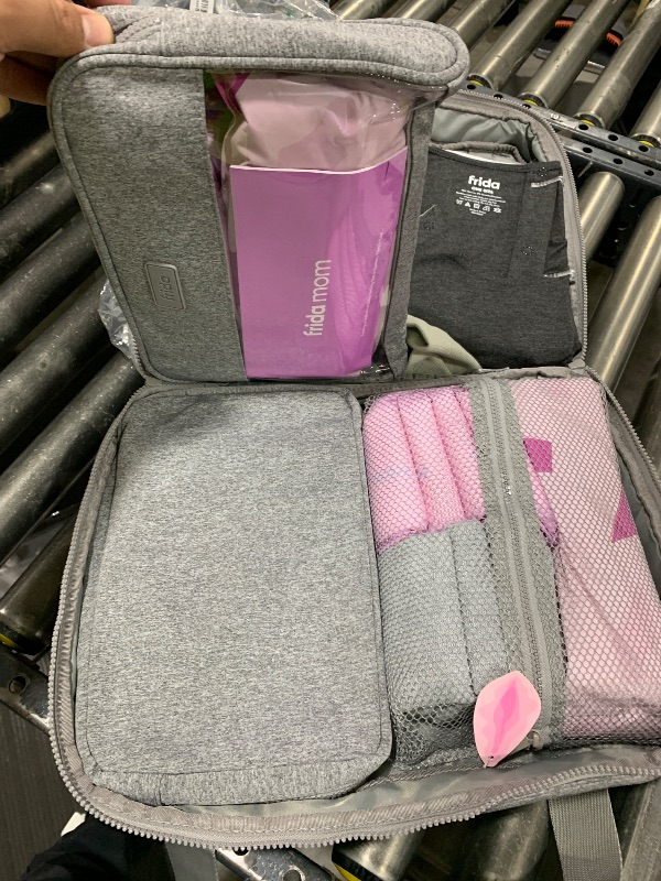 Photo 1 of Frida Mom 30pc Pre-Packed Hospital & Diaper Bag Essentials Gift Set, Includes Labor, Postpartum, & Newborn Grooming Kit in One, Easy to Organize with Removable Toiletry Bags, & Suitcase Strap