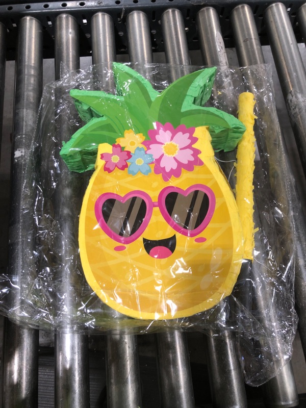 Photo 1 of pineapple pinata with stick