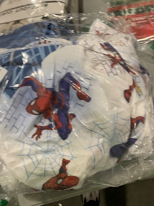 Photo 1 of Marvel Spiderman Wall Crawler Red, White, and Blue Spider Webs 4 Piece Toddler Bed Set - Comforter, Fitted Bottom Sheet, Flat Top Sheet, and Reversible Pillowcase