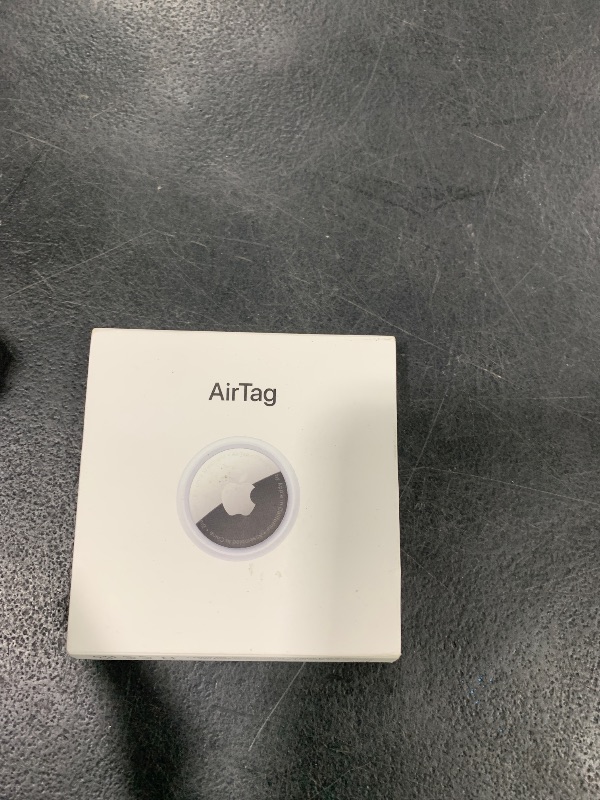 Photo 1 of Apple AirTag. Keep Track of and find Your Keys, Wallet, Luggage, Backpack, and More. Simple one-tap Set up with iPhone or iPad
