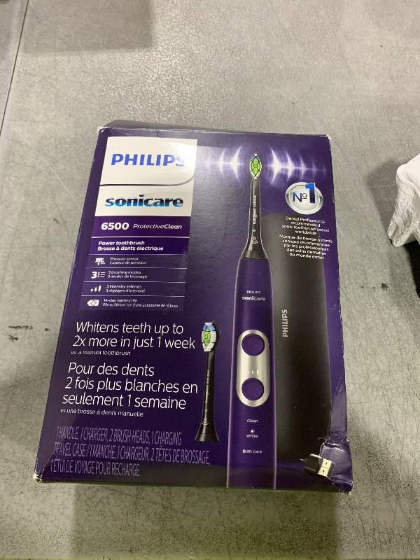 Photo 1 of PHILIPS Sonicare Protective Clean 6500 Rechargeable Electric Toothbrush with Charging Travel Case and Extra Brush Head, Deep Purple, 2 Count