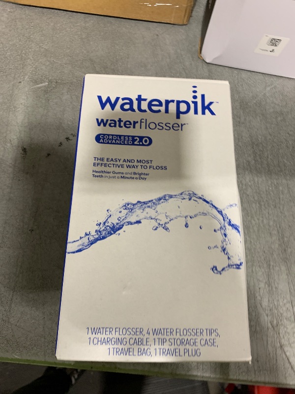 Photo 1 of Waterpik Cordless Advanced 2.0 Water Flosser For Teeth, Gums, Braces, Dental Care With Travel Bag and 4 Tips, ADA Accepted, Rechargeable, Portable, and Waterproof, Black WP-582, Packaging May Vary