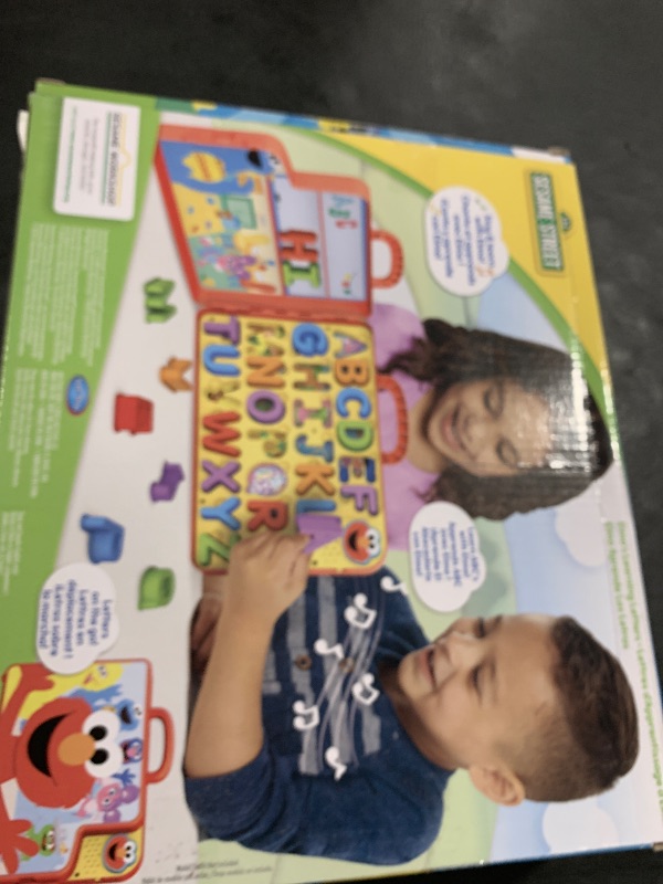 Photo 1 of SESAME STREET Elmo’s Learning Letters Bus Activity Board, Preschool Learning and Education, Kids Toys for Ages 2 Up by Just Play