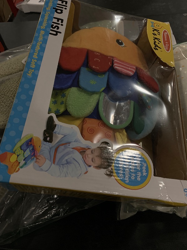 Photo 1 of Melissa & Doug Flip Fish Soft Baby Toy Sensory Tummy Time Toys, Soft Fabric Tag Toy for Babies, Infants