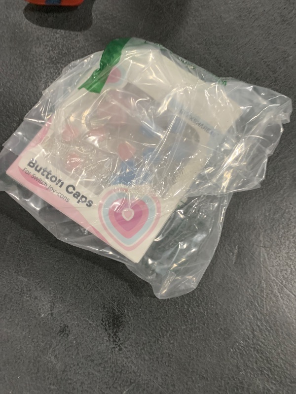Photo 1 of GeekShare Silicone Cross D-Pad Button Caps Set Heart Shape Joystick Cover - ABXY Key Buttons Sticker Compatible with Switch/OLED Joy-Con - Pink & Blue