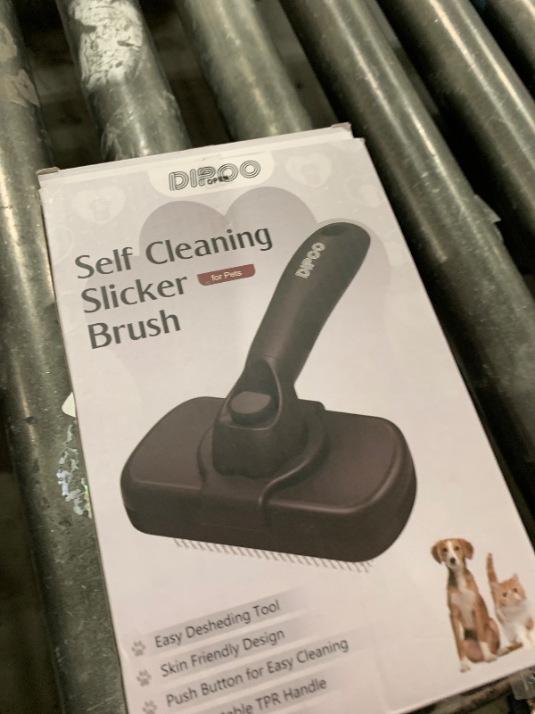 Photo 1 of Dipoo Self Cleaning Shedding Brush - Skin Friendly Grooming Tool for Dogs, Cats, and Puppies, Deshedding and Hair Removal for Long and Short Haired Pets, Black