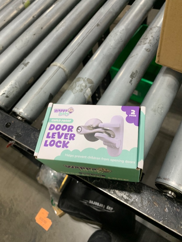 Photo 1 of Door Lever Lock (2 Pack) – Prevents Toddlers from Opening Doors – Easy One-Hand Operation for Adults – Durable ABS with 3M Adhesive Backing – No Tools Needed for Install