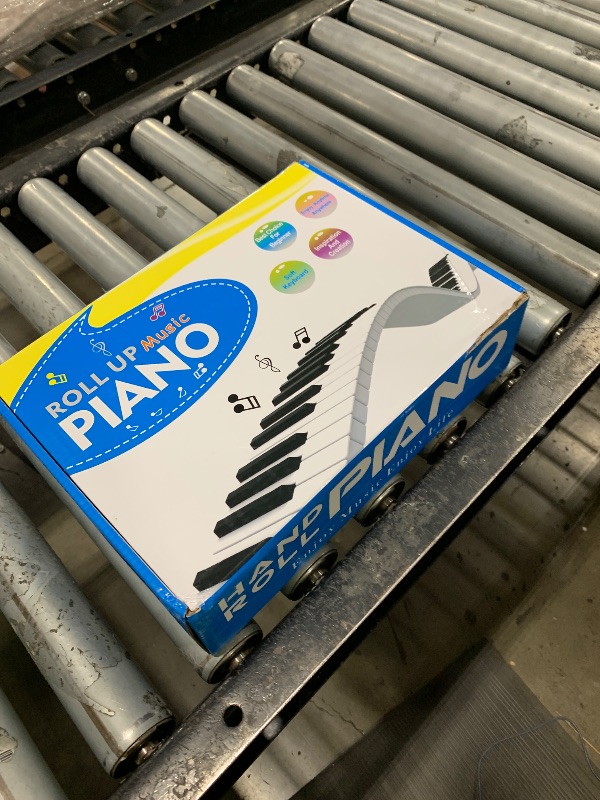 Photo 1 of Roll-up Piano 61 keys,Electronic Hand Roll Portable Piano with 128 Unique Tones and Built-in Speaker, Upgraded Waterproof Silicone Fold able Piano Keyboard for Beginners and Kids