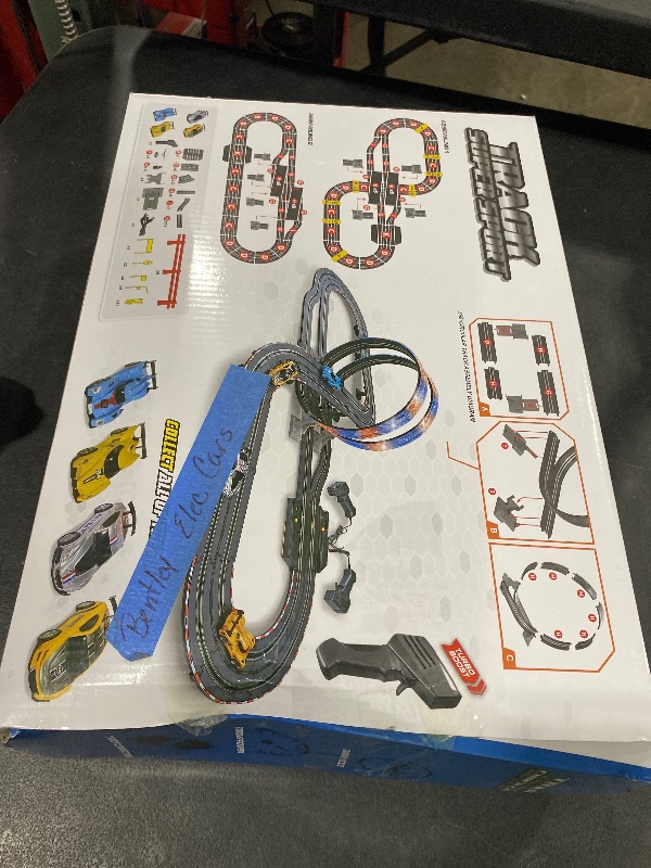 Photo 1 of Slot Car Race Track Set, 19ft Electric Track with LED Lights and 4 Slot Cars, 2 Hand Controllers and Racing Game Lap Counters, Set Features Loop, Turns, and Crossover for Boys Age 6-12LPNPMEY7085081
