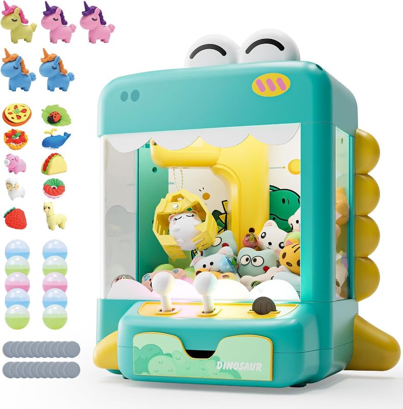 Photo 1 of Skirfy Dinosuar Claw Machine, Mini Vending Machine with Lights & Music, Adjustable Sound, Candy and Electronic Prize Dispenser, Includes 45 Toys, Candy and Birthday Gift for Kids Boys