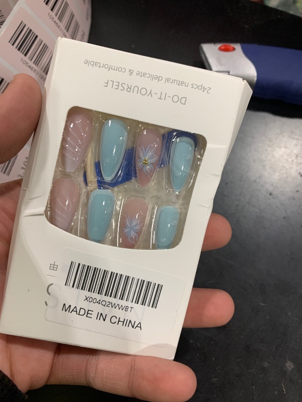 Photo 1 of 24Pcs Blue Flower Press on Nails Medium Almond French Tip Fake Nails with Gold Starfish Rhinestones Design 3D Ripple False Nails Full Cover Artificial Glue on Nails Summer Stick on Nails for Women DIY